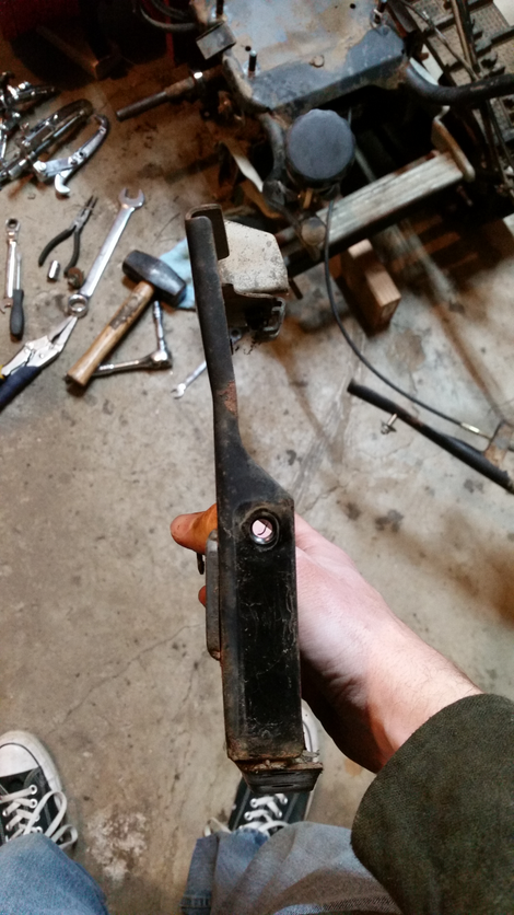 Can see where the bending flaked off the paint and it then rusted in the years since the Flattening; note that it is bent about 1/3 of the way from the top as well as shifted at the bottom. The whole thing should be flat.